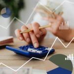 Woman using calculator with financial graph overlay, indicating data analysis and finance planning.